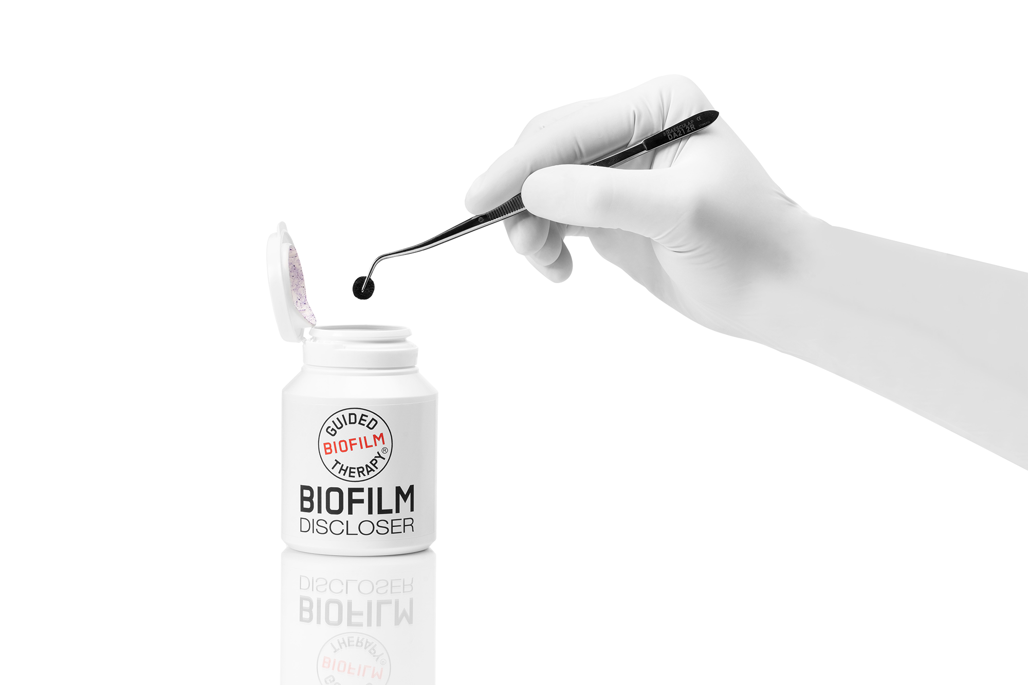 Barattolo del rivelatore di biofilm con pellet applicato tramite pinzetta